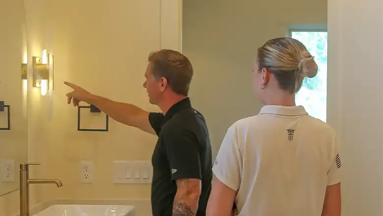 Here two techs are checking work. handling a misse bit of paint