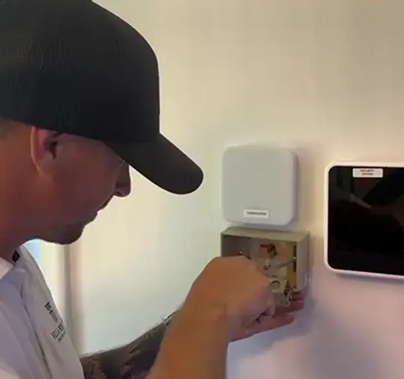 Technician mounting a new light switch in Council Bluffs. Commercial handyman Omaha businesses trust. Villa My Home provides fast repairs, maintenance plans, and tenant improvements for offices and retail spaces.