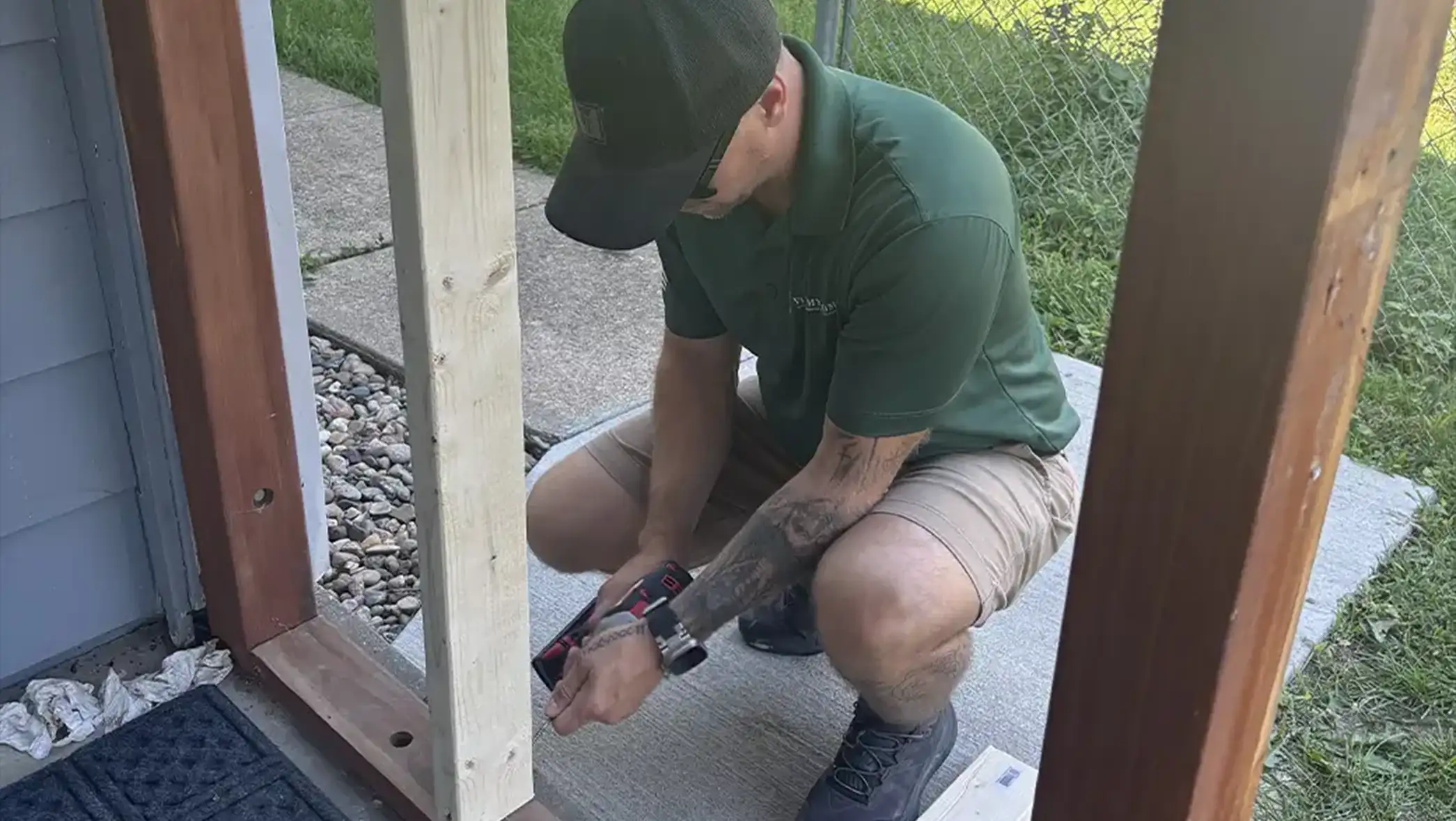 A Maintenance Tech repairing studwork that was previously broken