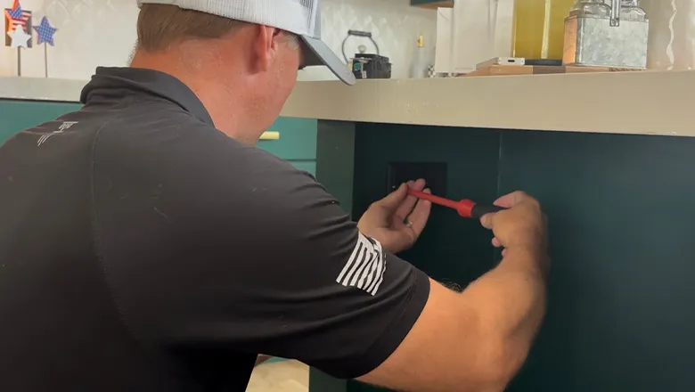 A new power outlet in a kitchen being installed in one of our clients homes in omaha